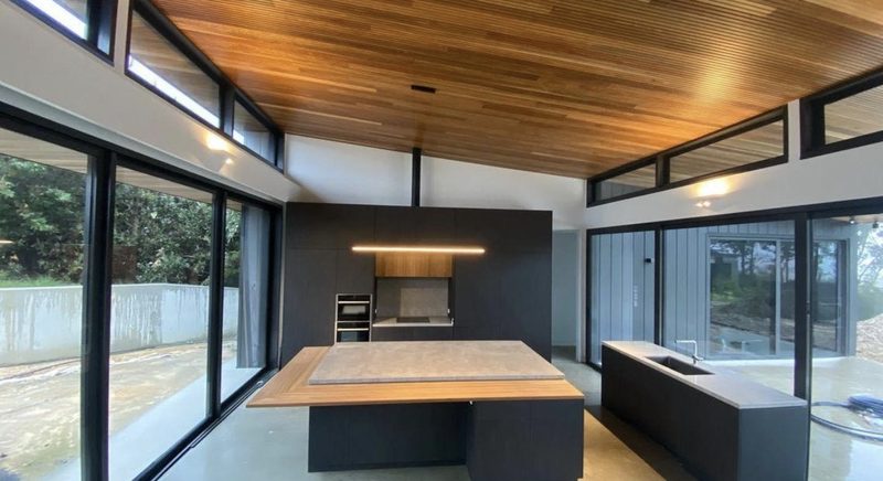 Kitchen with timber-clad ceiling