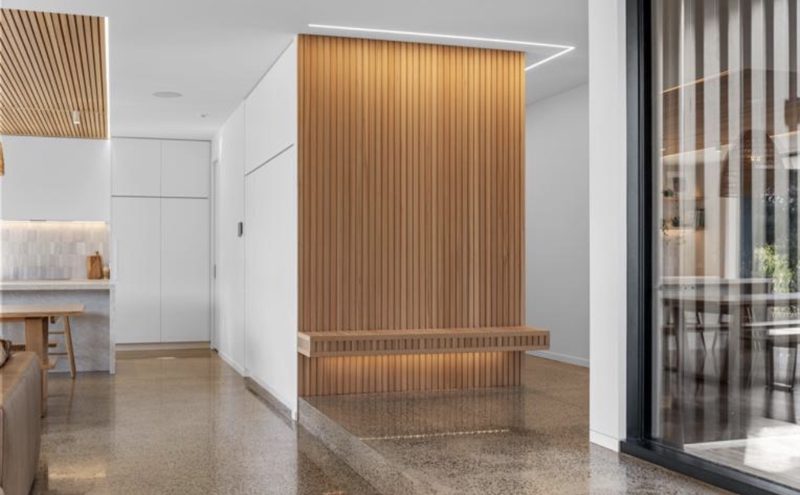 Slatted timber feature wall with bench